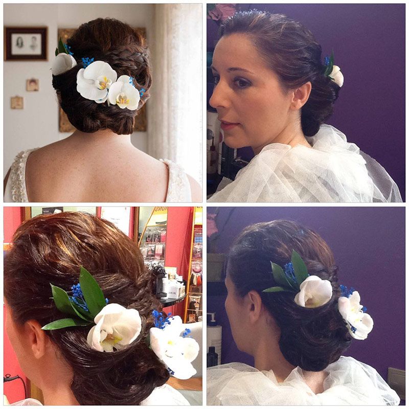 Peinado recogido con flores para novia