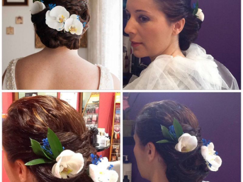 Peinado recogido con flores para novia